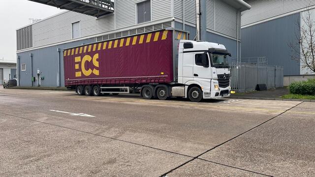 URS Choices trailer parked at a warehouse loading bay